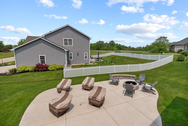 6028 Star Grass Ln, Racine, WI 53406 - fenced backyard featuring an outdoor fire pit and a patio
