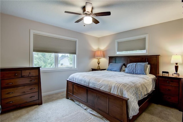 964 S Kelly Rd, Ellsworth, WI 54011 - bedroom featuring light carpet and a ceiling fan