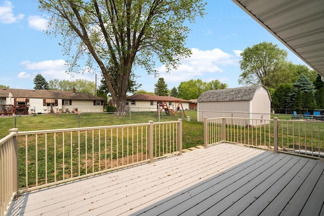 2711 Hyacinth Ave, Janesville, WI 53545 - deck with a storage unit and a fenced backyard