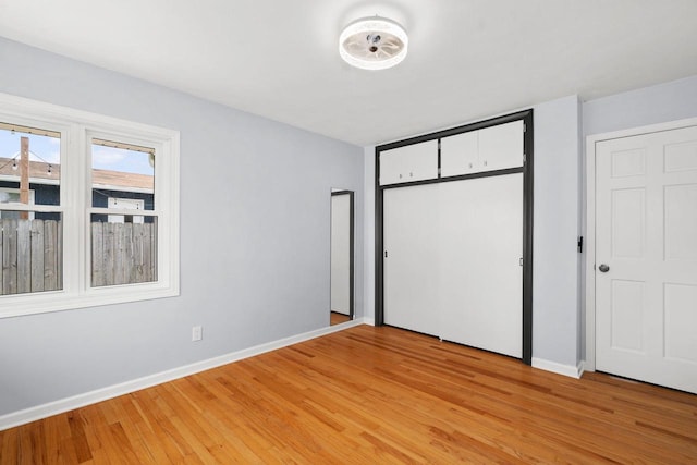 2711 Hyacinth Ave, Janesville, WI 53545 - unfurnished bedroom featuring light wood-type flooring and a closet