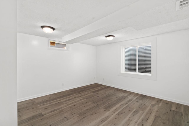 2711 Hyacinth Ave, Janesville, WI 53545 - unfurnished room featuring wood finished floors and a textured ceiling