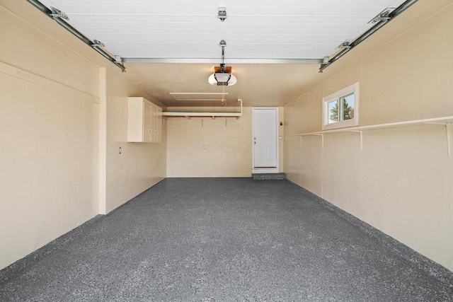 2711 Hyacinth Ave, Janesville, WI 53545 - garage with a garage door opener
