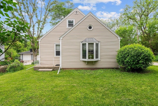 7838 N Sherman Blvd, Brown Deer, WI 53209 - rear view of house with a yard