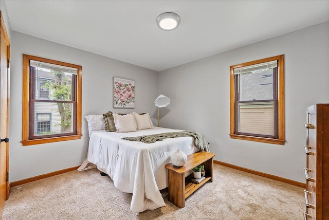7838 N Sherman Blvd, Brown Deer, WI 53209 - bedroom featuring baseboards and light colored carpet
