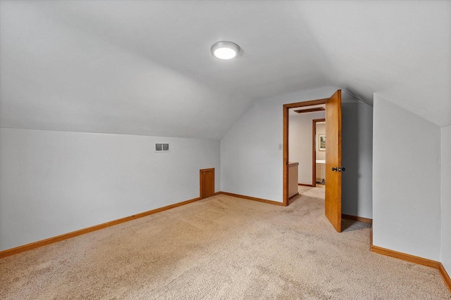 7838 N Sherman Blvd, Brown Deer, WI 53209 - additional living space with light colored carpet and vaulted ceiling