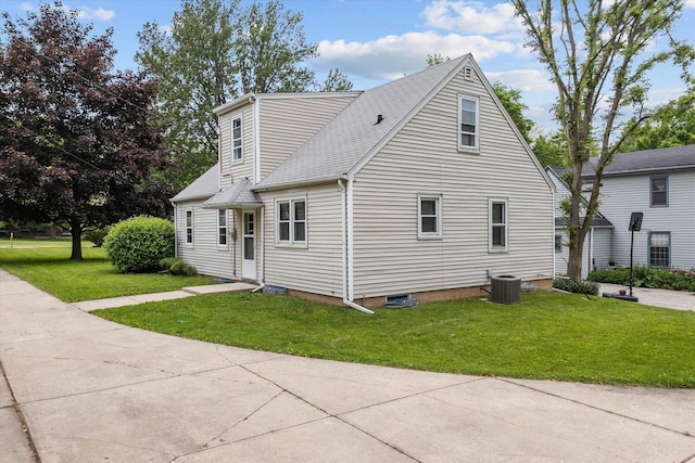 7838 N Sherman Blvd, Brown Deer, WI 53209 - view of home's exterior featuring a yard and roof with shingles