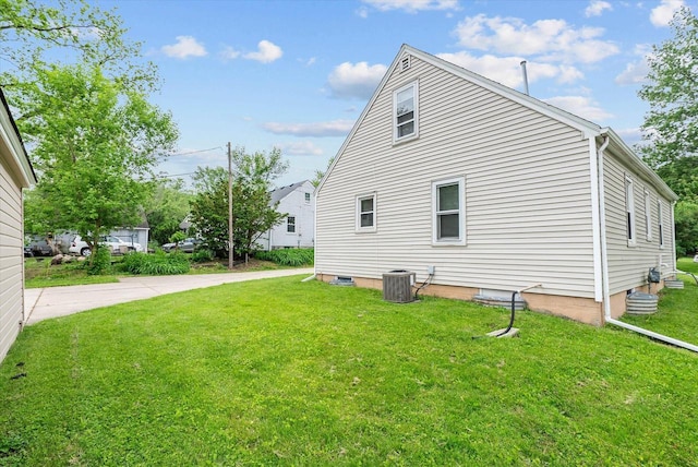 7838 N Sherman Blvd, Brown Deer, WI 53209 - view of property exterior featuring a yard and a cooling unit