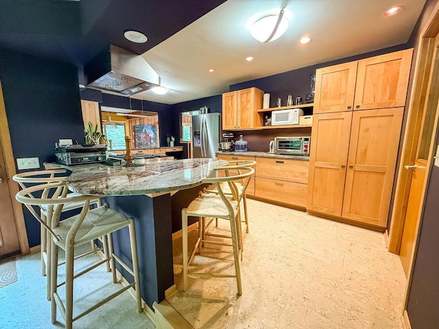 5362 Mahocker Rd, Mazomanie, WI 53560 - kitchen featuring white microwave, stainless steel fridge with ice dispenser, open shelves, a breakfast bar area, and wall chimney range hood