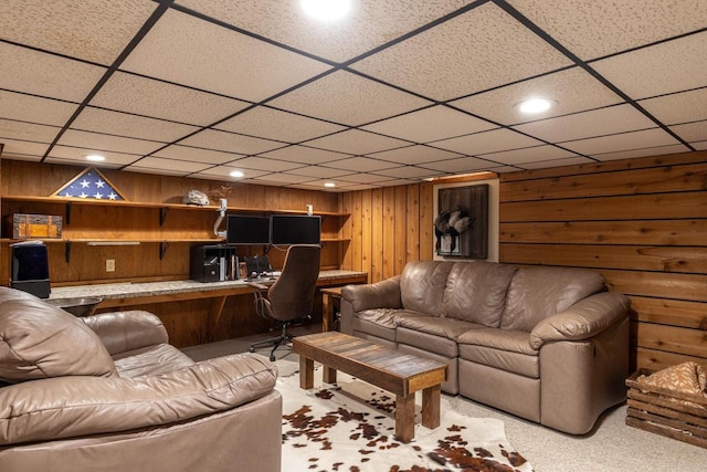 11 Meadowbrook Ct, Appleton, WI 54914 - carpeted living area featuring wooden walls, recessed lighting, a drop ceiling, and built in desk