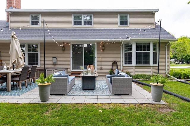 11 Meadowbrook Ct, Appleton, WI 54914 - rear view of property with an outdoor living space with a fire pit, a patio area, a yard, and a chimney