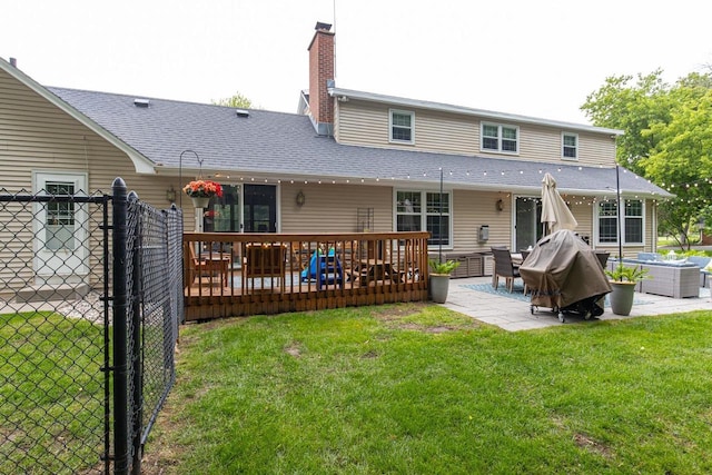11 Meadowbrook Ct, Appleton, WI 54914 - rear view of property with a patio area, a wooden deck, a chimney, and roof with shingles