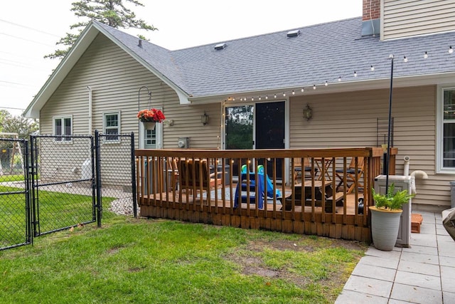 11 Meadowbrook Ct, Appleton, WI 54914 - back of house with a gate, roof with shingles, a wooden deck, and a chimney