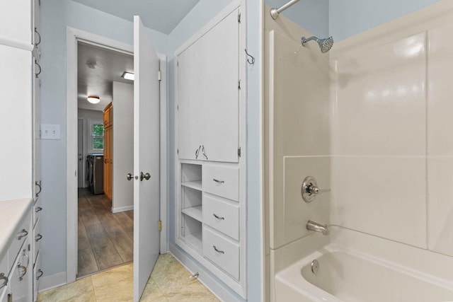 N1128 County Rd W, Fremont, WI 54940 - full bath featuring shower / bath combination, vanity, and tile patterned flooring