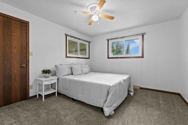 N1128 County Rd W, Fremont, WI 54940 - carpeted bedroom featuring baseboards and ceiling fan