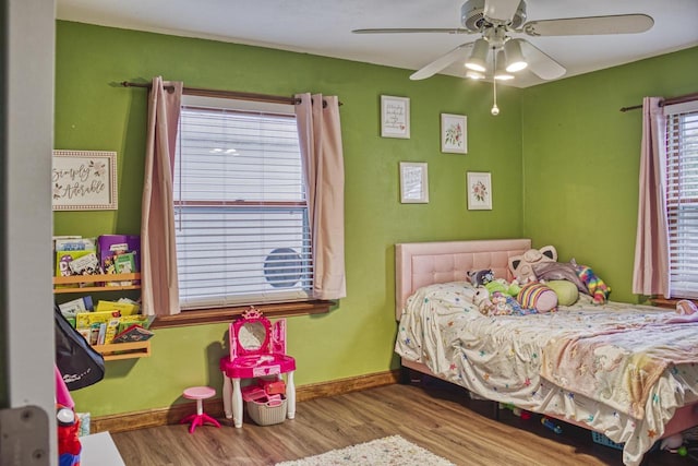 1702 S Douglas St, Appleton, WI 54914 - bedroom featuring wood finished floors and a ceiling fan