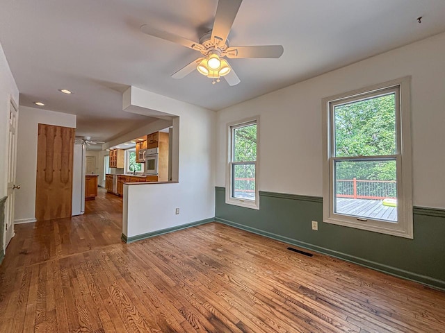 417 Anglesey Rd, Wales, WI 53183 - spare room with a ceiling fan, dark wood-style flooring, and recessed lighting