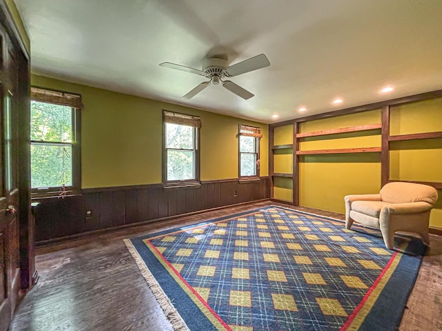 417 Anglesey Rd, Wales, WI 53183 - unfurnished room with a wainscoted wall, wood finished floors, a ceiling fan, recessed lighting, and wooden walls