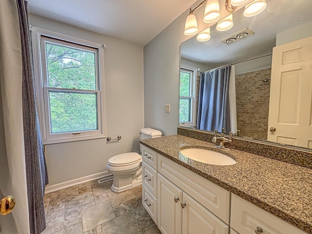 417 Anglesey Rd, Wales, WI 53183 - bathroom featuring stone tile flooring, vanity, and curtained shower