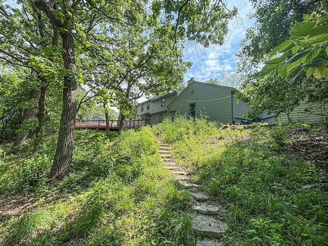 417 Anglesey Rd, Wales, WI 53183 - view of yard featuring a wooden deck