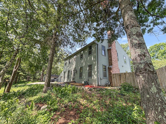417 Anglesey Rd, Wales, WI 53183 - view of side of property featuring a chimney