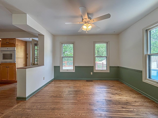 417 Anglesey Rd, Wales, WI 53183 - spare room featuring wood finished floors and ceiling fan