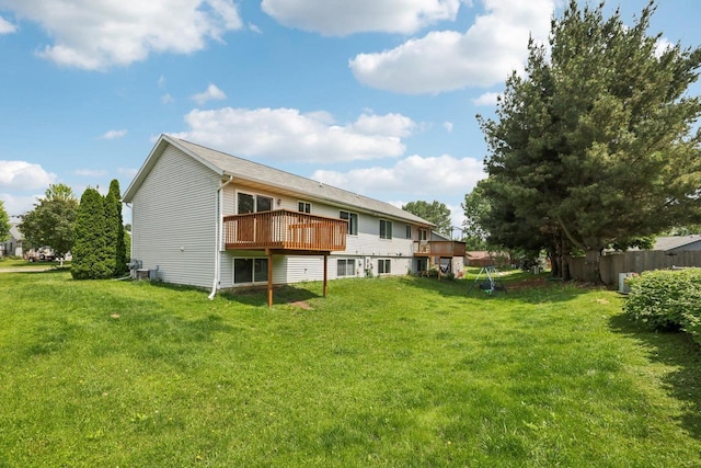 609-611 Eagle Crest Ct, Prairie Du Sac, WI 53578 - rear view of house with a wooden deck and a yard