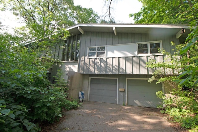 6202 Piping Rock Rd, Madison, WI 53711 - view of front facade with an attached garage and driveway