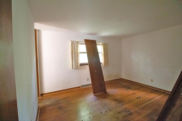6202 Piping Rock Rd, Madison, WI 53711 - empty room featuring wood-type flooring