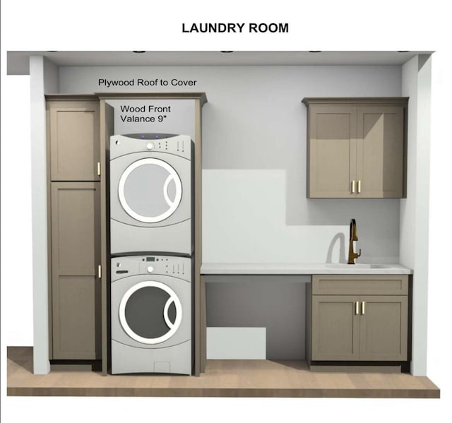LT3 E Miramar Dr, East Troy, WI 53120 - laundry room featuring stacked washer / dryer and cabinet space