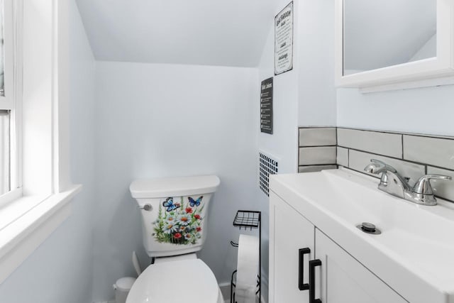 1133 Racine St, Delavan, WI 53115 - bathroom with vanity and tasteful backsplash