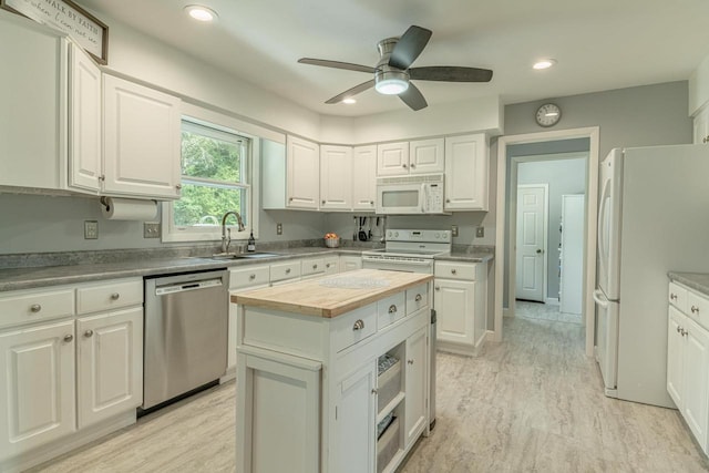 3472 Hickory Hill Rd, Verona, WI 53593 - kitchen with white appliances, wood counters, white cabinetry, a ceiling fan, and recessed lighting