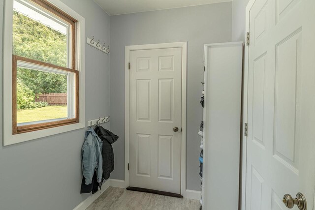 3472 Hickory Hill Rd, Verona, WI 53593 - entryway with baseboards and light wood finished floors