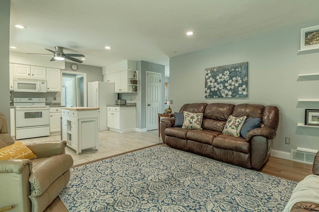 3472 Hickory Hill Rd, Verona, WI 53593 - living area featuring light wood finished floors, a ceiling fan, and recessed lighting