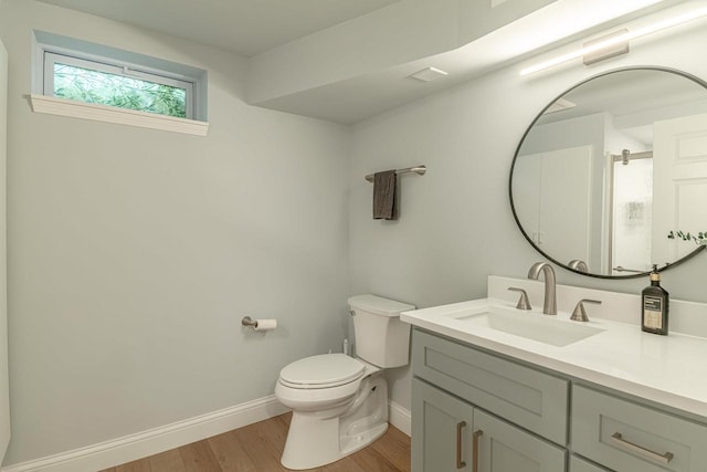 3472 Hickory Hill Rd, Verona, WI 53593 - bathroom with wood finished floors and vanity