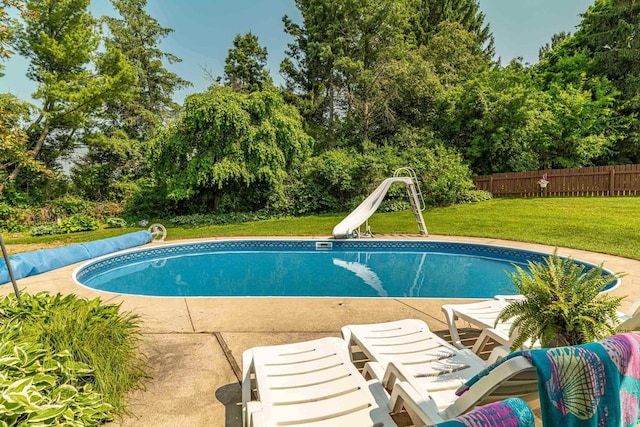 3472 Hickory Hill Rd, Verona, WI 53593 - view of pool featuring a water slide and view of wooded area