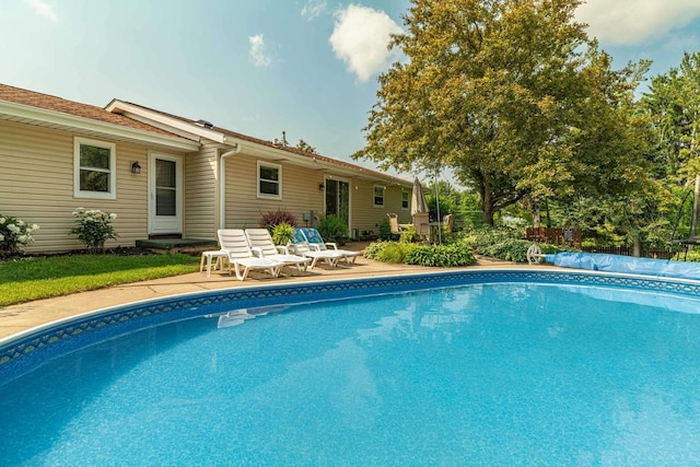3472 Hickory Hill Rd, Verona, WI 53593 - view of swimming pool with a covered pool and a patio area