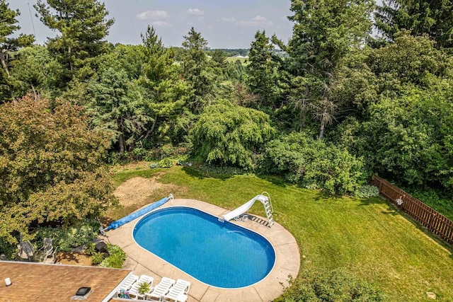 3472 Hickory Hill Rd, Verona, WI 53593 - view of pool with a water slide and a wooded view