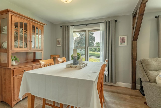 3472 Hickory Hill Rd, Verona, WI 53593 - dining room with light wood-type flooring and baseboards