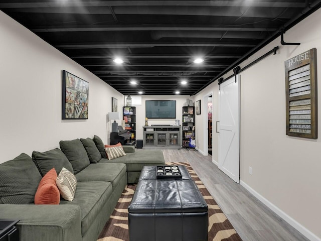 3605 Emmertsen Rd, Racine, WI 53406 - living area featuring a barn door and wood finished floors