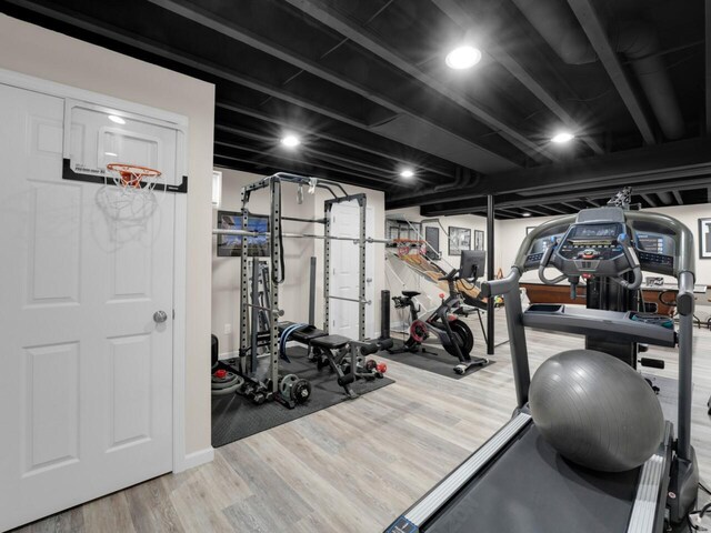 3605 Emmertsen Rd, Racine, WI 53406 - exercise room with wood finished floors and baseboards