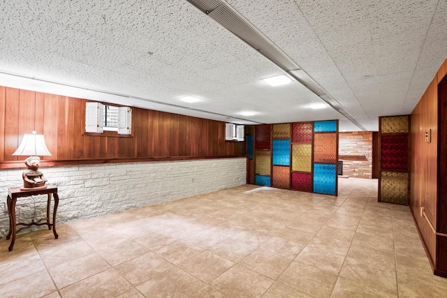 3358 Taylor Ave, Elmwood Park, WI 53405 - basement featuring wood walls and light tile patterned floors