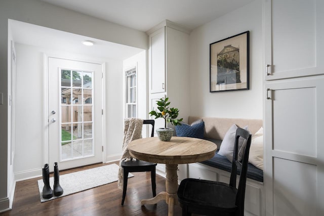 2461 N 94th St, Wauwatosa, WI 53226 - dining space featuring dark wood-type flooring and baseboards