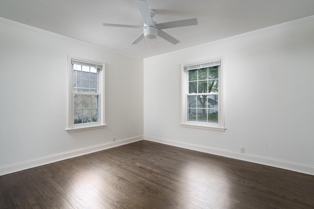 2461 N 94th St, Wauwatosa, WI 53226 - spare room featuring ornamental molding, plenty of natural light, a ceiling fan, and dark wood-type flooring