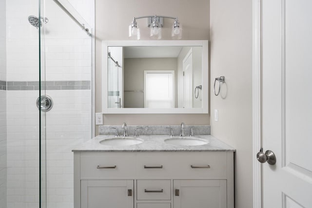 2461 N 94th St, Wauwatosa, WI 53226 - bathroom with a tile shower and double vanity