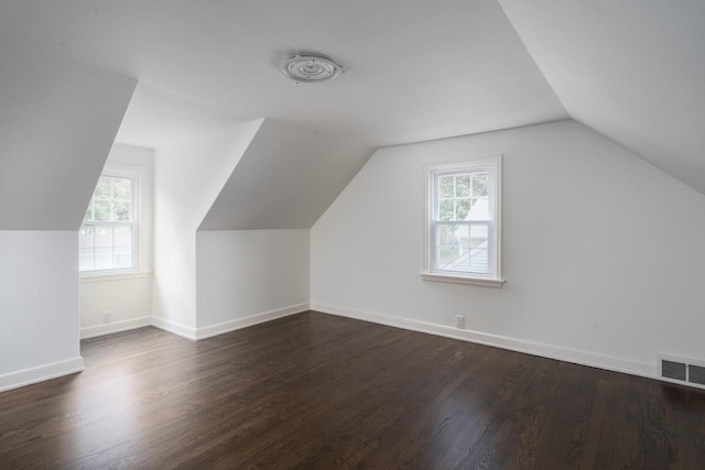 2461 N 94th St, Wauwatosa, WI 53226 - bonus room featuring wood finished floors and lofted ceiling