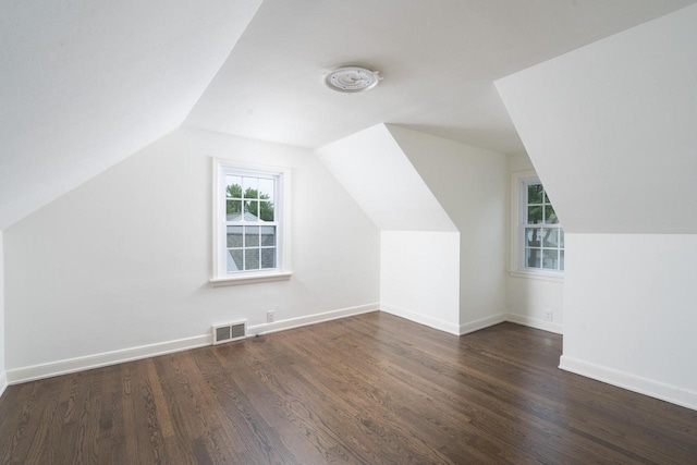 2461 N 94th St, Wauwatosa, WI 53226 - bonus room featuring wood finished floors and lofted ceiling