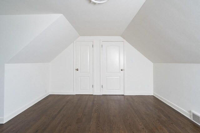 2461 N 94th St, Wauwatosa, WI 53226 - bonus room featuring wood finished floors and vaulted ceiling