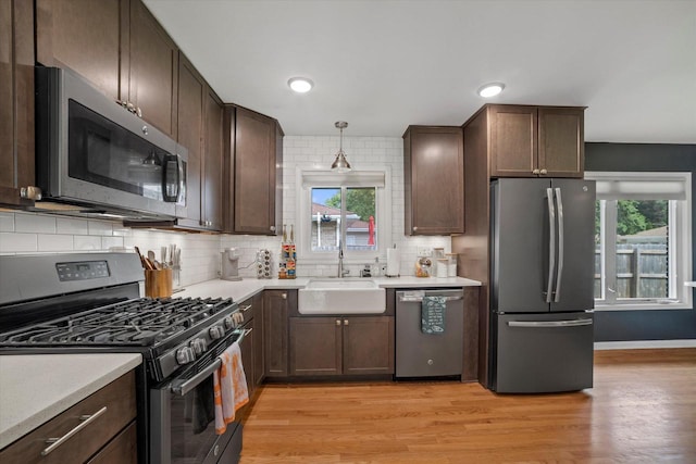 3351 W Vogel Ave, Greenfield, WI 53221 - kitchen featuring stainless steel appliances, plenty of natural light, light countertops, and recessed lighting