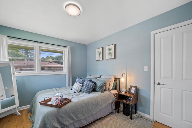 3351 W Vogel Ave, Greenfield, WI 53221 - bedroom with wood finished floors and baseboards