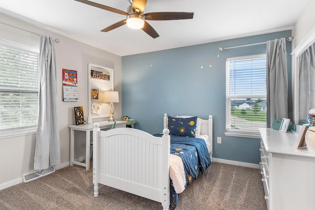 650 W Silverleaf Ct, Plover, WI 54467 - carpeted bedroom with ceiling fan and baseboards